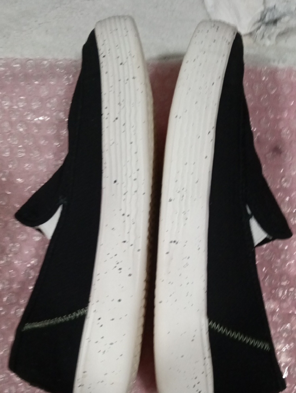 Hey Dude Black Slip-On Sneakers with White Speckled Sole